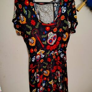 From Disney's Coco skull printed dia de los muertos themed dress